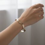 Gouden Christian slavenarmband golvend model