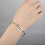 Christian wit goud slavenarmband met zirkonia