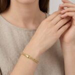 Gouden gevlochten armband