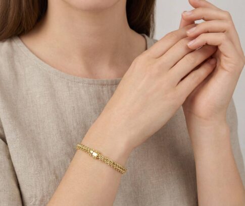 Gouden gevlochten armband