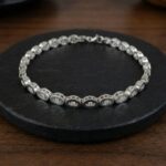 Christian wit gouden ovale armband