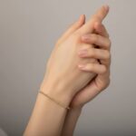 Gouden Christian balletjes armband