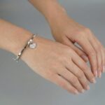 Christian wit goud slavenarmband met zirkonia