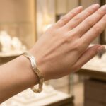 Christian gouden slavenarmband golvend model