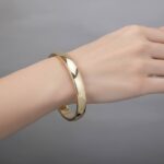 Christian slavenarmband 14 karaat goud