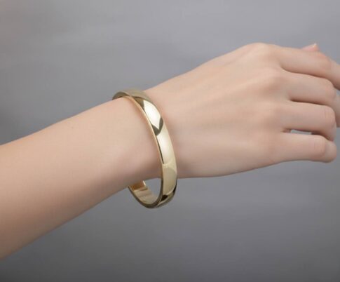 Christian slavenarmband 14 karaat goud