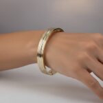 Christian gouden slavenarmband tricolor