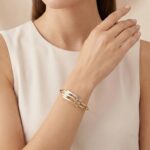 Christian gouden tricolor slavenarmband