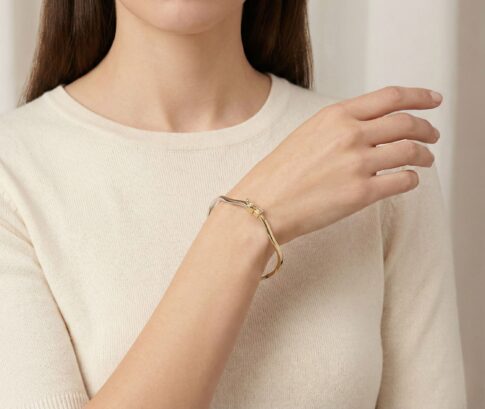 14 karaat gouden bicolor slavenarmband Christian