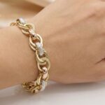 Gouden tricolor schakelarmband