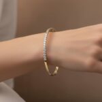 Goud Christian slavenarmband met diamanten