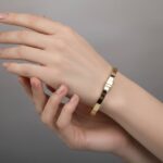 14 karaat geel gouden Christian slavenarmband