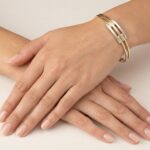 Wit en geel gouden Christian scharnier armband