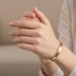 Geel gouden Christian 14 karaat slavenarmband