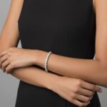 Wit gouden Christian tennis armband