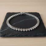 Wit gouden Christian tennis armband