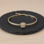 Gouden fantasie armband met zirkonia