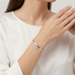 Christian wit goud slavenarmband met zirkonia