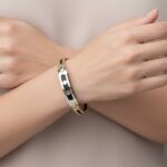 Gouden slavenarmband met leer