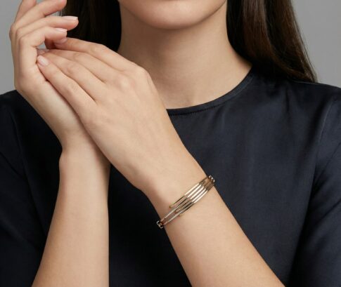 Bicolor gouden Christian slavenarmband