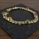 Gouden armband met amethist en toermalijn