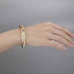 Christian slavenarmband goud 14 karaat