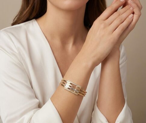 Gouden tricolor slavenarmband met zirkonia