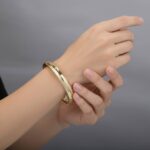 Christian slavenarmband goud 14 karaat