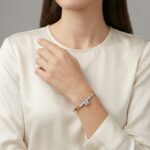 Bicolor goud Christian slavenarmband