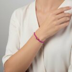 Roze armband met gouden kubus