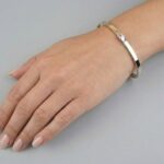 Gouden bicolor Christian slavenarmband