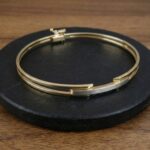 Gouden Christian scharnier armband