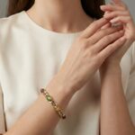 Gouden armband met amethist en toermalijn