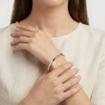 Gouden bicolor Christian slavenarmband