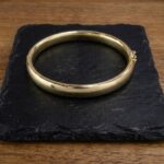 Christian slavenarmband goud 14 karaat