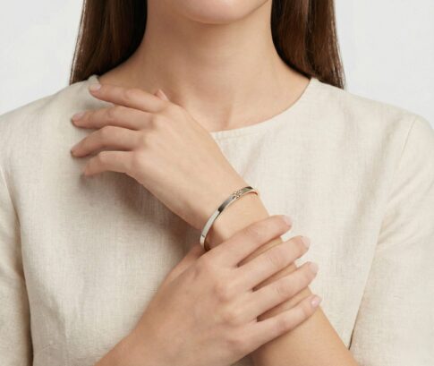 Gouden bicolor Christian slavenarmband