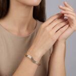 Christian gouden slavenarmband golvend model