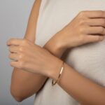 Christian slavenarmband goud