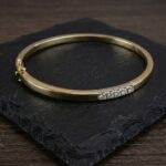 Gouden Christian slavenarmband met diamanten