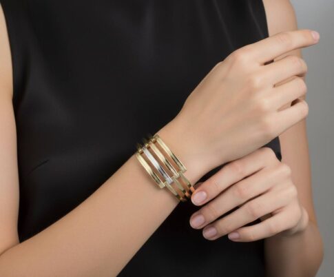 Gouden tricolor slavenarmband