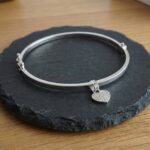 Christian wit goud slavenarmband met zirkonia