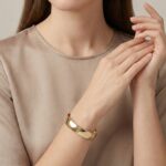 Christian 14 karaat geel gouden slavenarmband