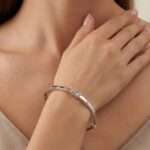 Christian wit gouden slavenarmband