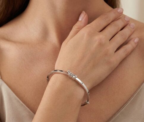 Christian wit gouden slavenarmband