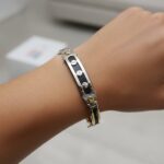 Gouden slavenarmband met leer