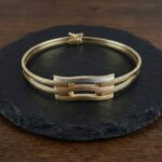 Christian gouden tricolor slavenarmband