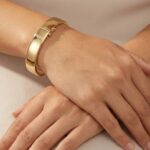 Christian 14 karaat geel gouden slavenarmband