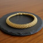 Christian goud geweven armband