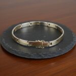 Christian goud bicolor armband