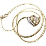 Gouden collier met diamant hart hanger